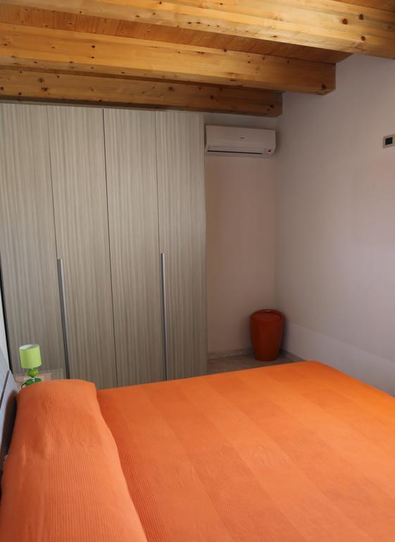 פקינו Casa Vacanze Calafarina חדר תמונה